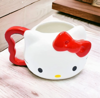 TAZA 3D HELLO KITTY MOÑO ROJO CABEZA